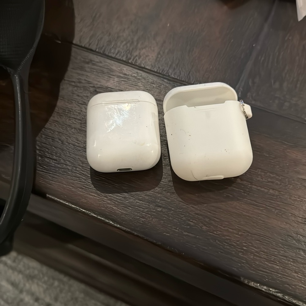 Gen 1 Apple AirPods with protective case!